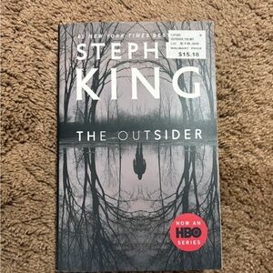 The Outsider Paperback - Black and Gray Cover
